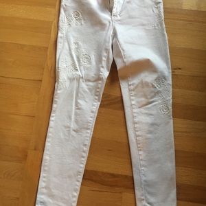 White embroided jeans